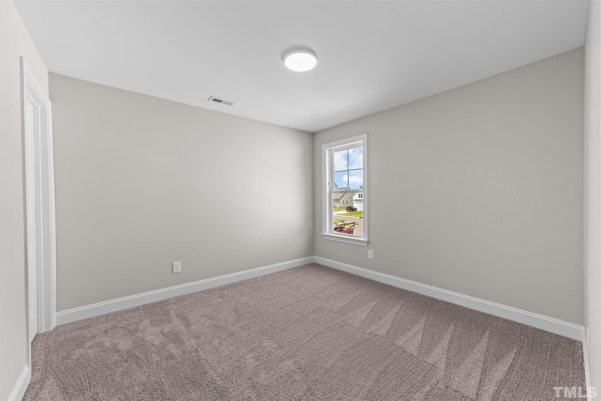 4530 Fairhaven Drive Wilson, NC 27893 - Photo 30 of 49 an empty room with windows