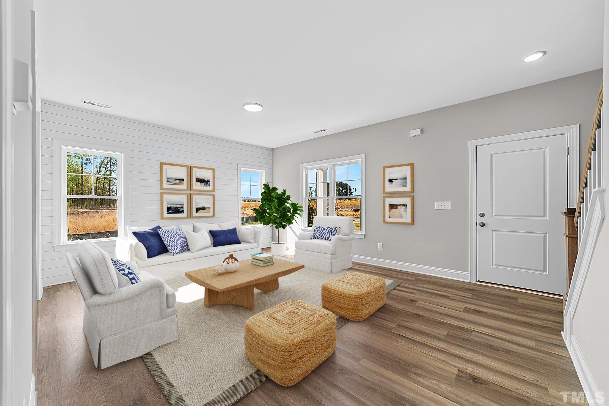 4530 Fairhaven Drive Wilson, NC 27893 - Photo 3 of 49 a living room with furniture and a wooden floor
