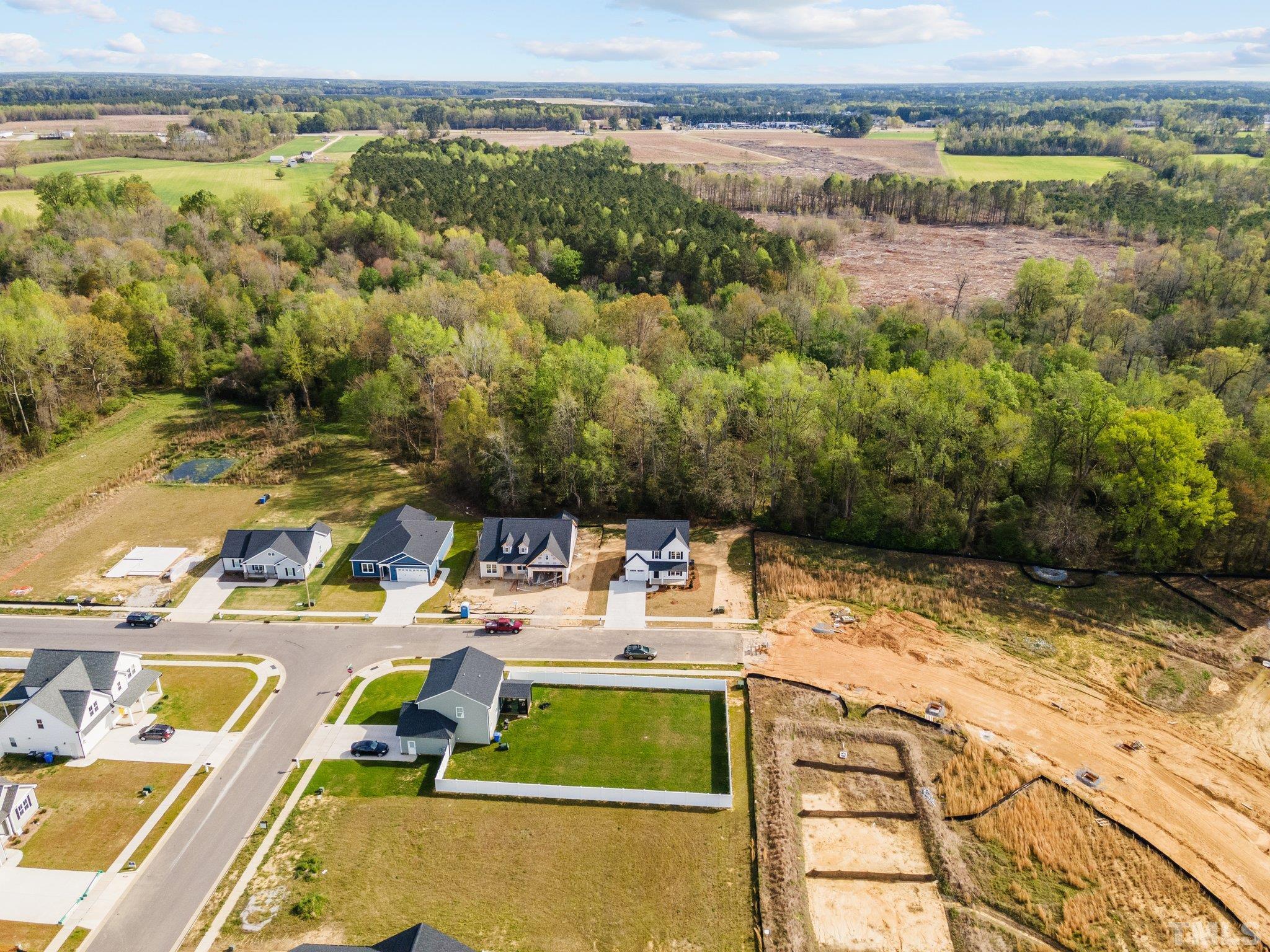 4530 Fairhaven Drive Wilson, NC 27893 - Photo 47 of 49 a view of a lake with houses
