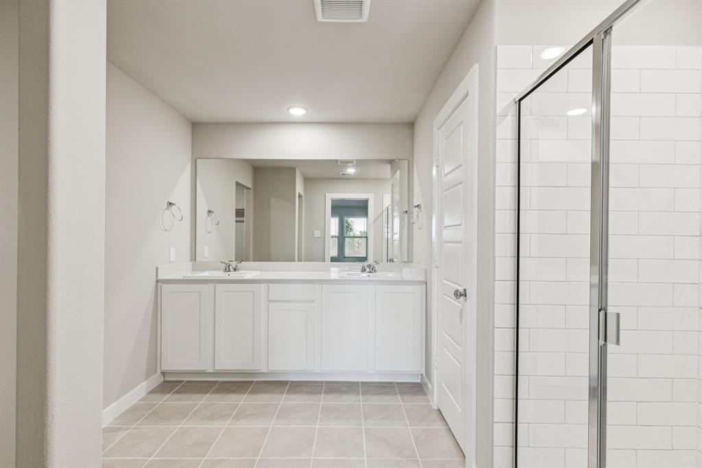 849 Rockcloud Drive Haslet, TX 76052 - Photo 16 of 27 Primary Bathroom in the Harper home plan by Trophy Signature Homes – REPRESENTATIVE PHOTO
