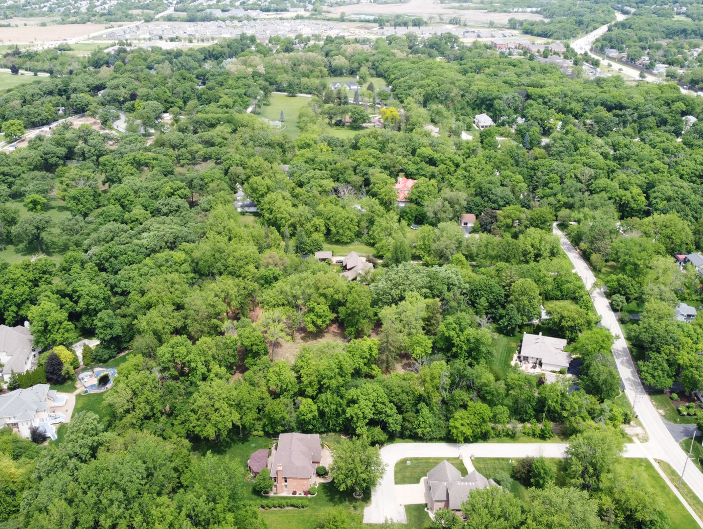 7N650 Sayer Road Bartlett, IL 60103 - Photo 9 of 13 an aerial view of residential house with outdoor space and trees all around