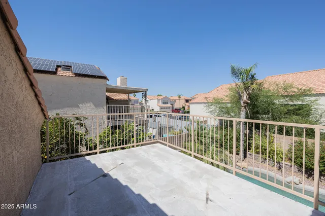 a view of a balcony with an outdoor space