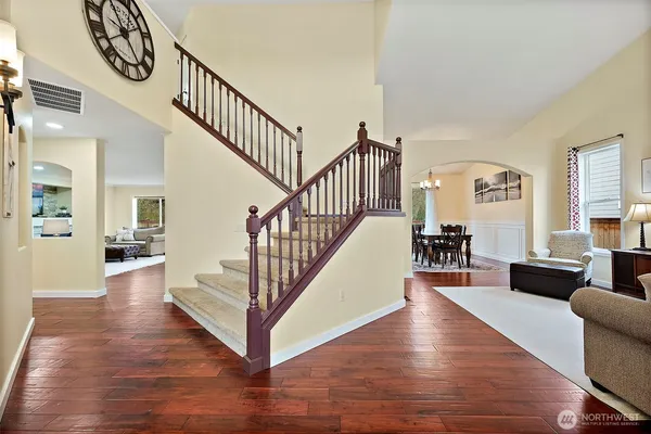 a living room with furniture and a table