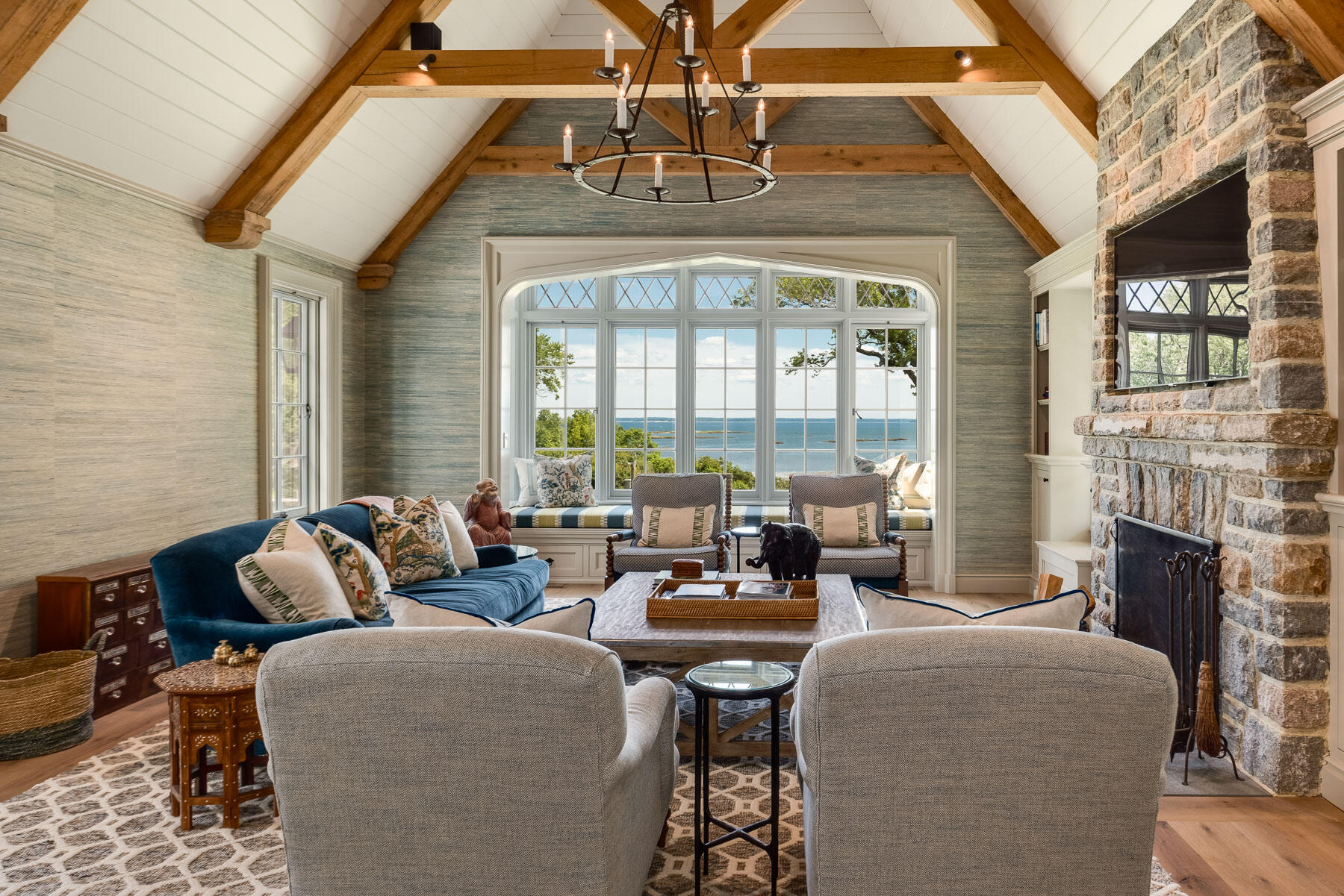 16 Raiders Lane Darien, CT 06820 - Photo 16 of 53 a living room with fireplace furniture and a chandelier