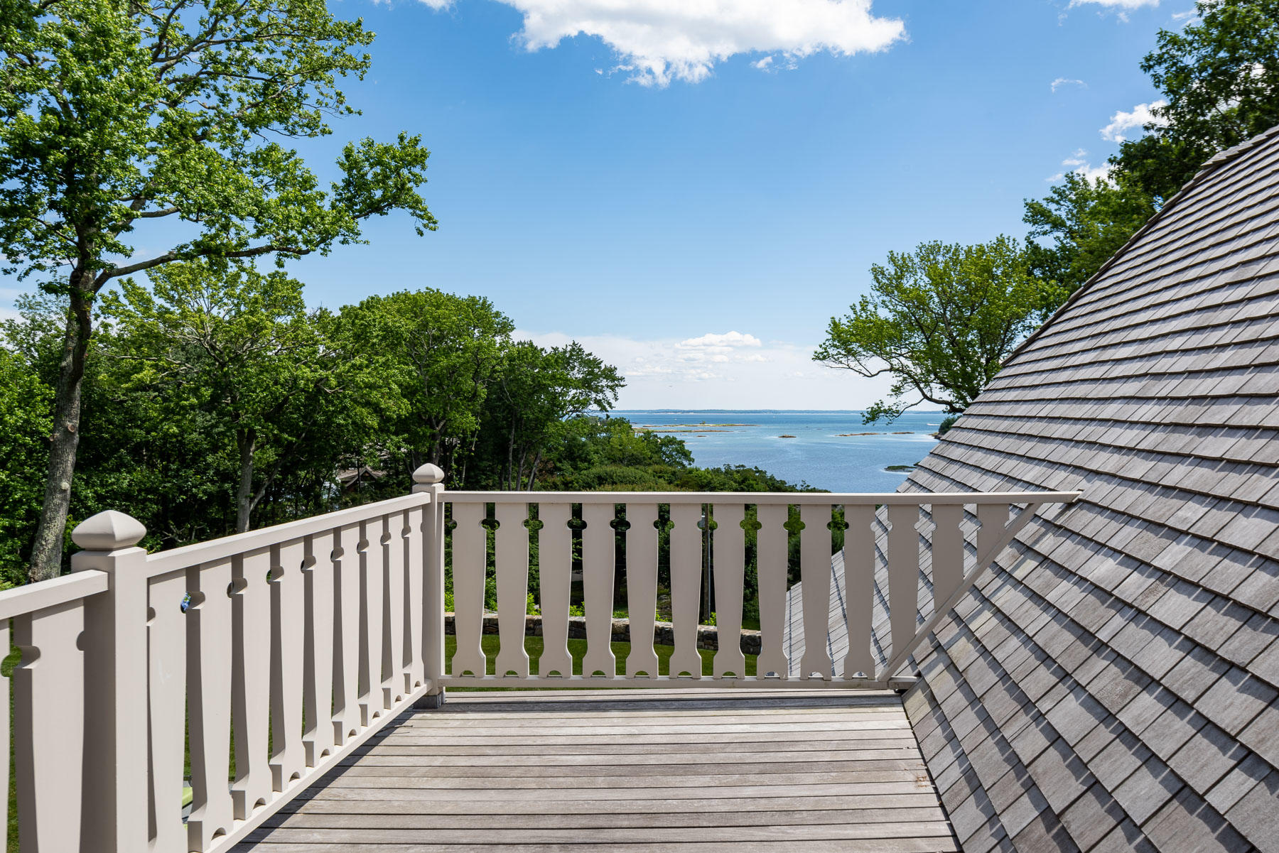 16 Raiders Lane Darien, CT 06820 - Photo 27 of 53 a view of deck with wooden floor and fence