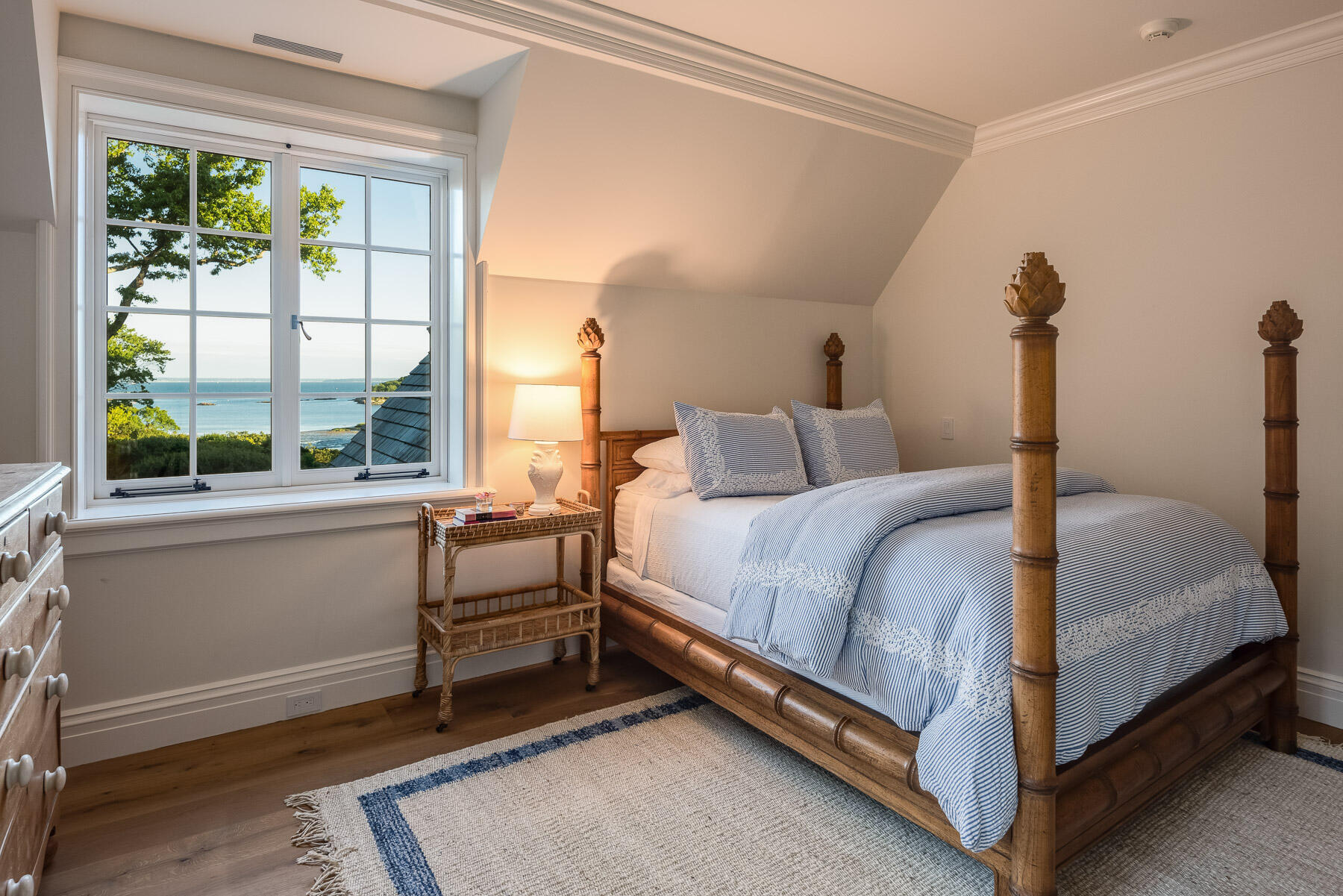 16 Raiders Lane Darien, CT 06820 - Photo 30 of 53 a bedroom with a bed and a large window