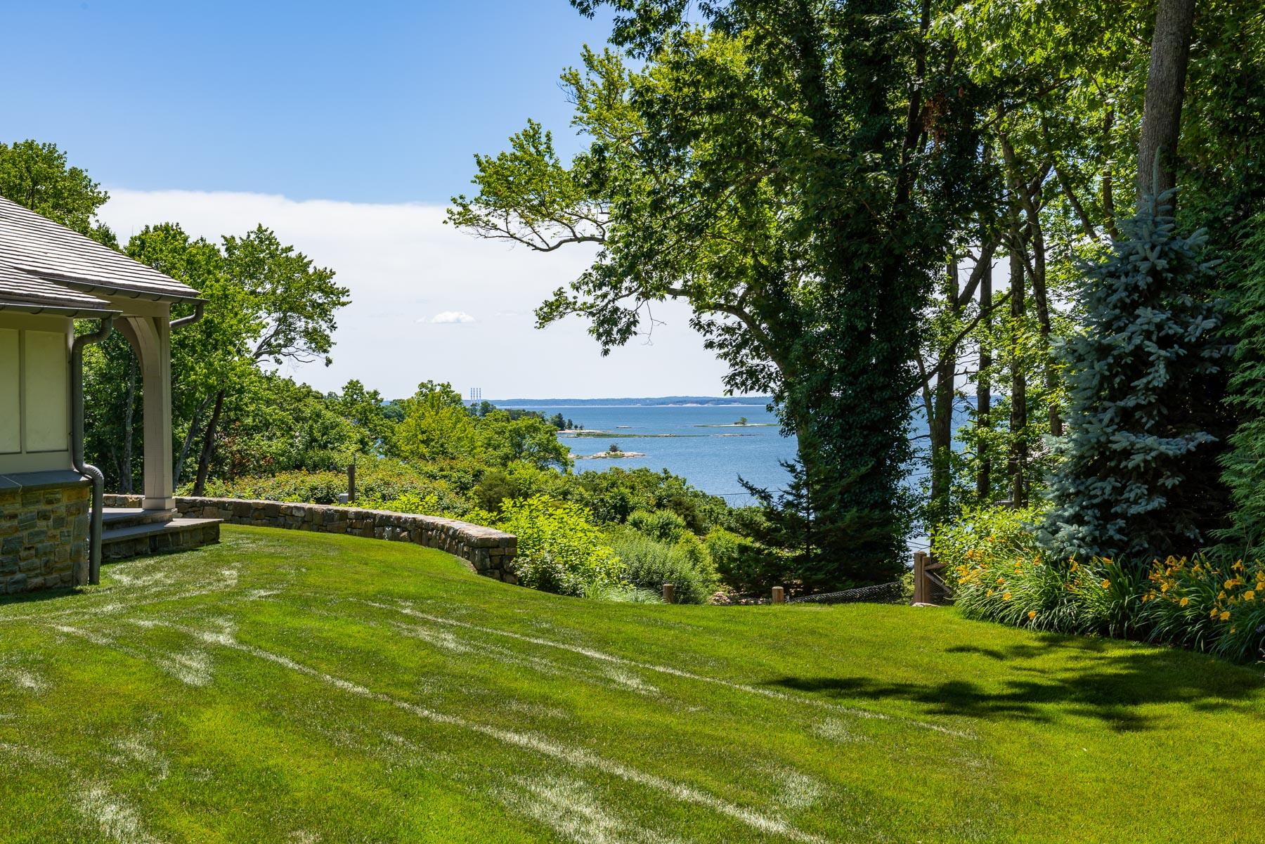 16 Raiders Lane Darien, CT 06820 - Photo 42 of 53 a view of a swimming pool with a patio