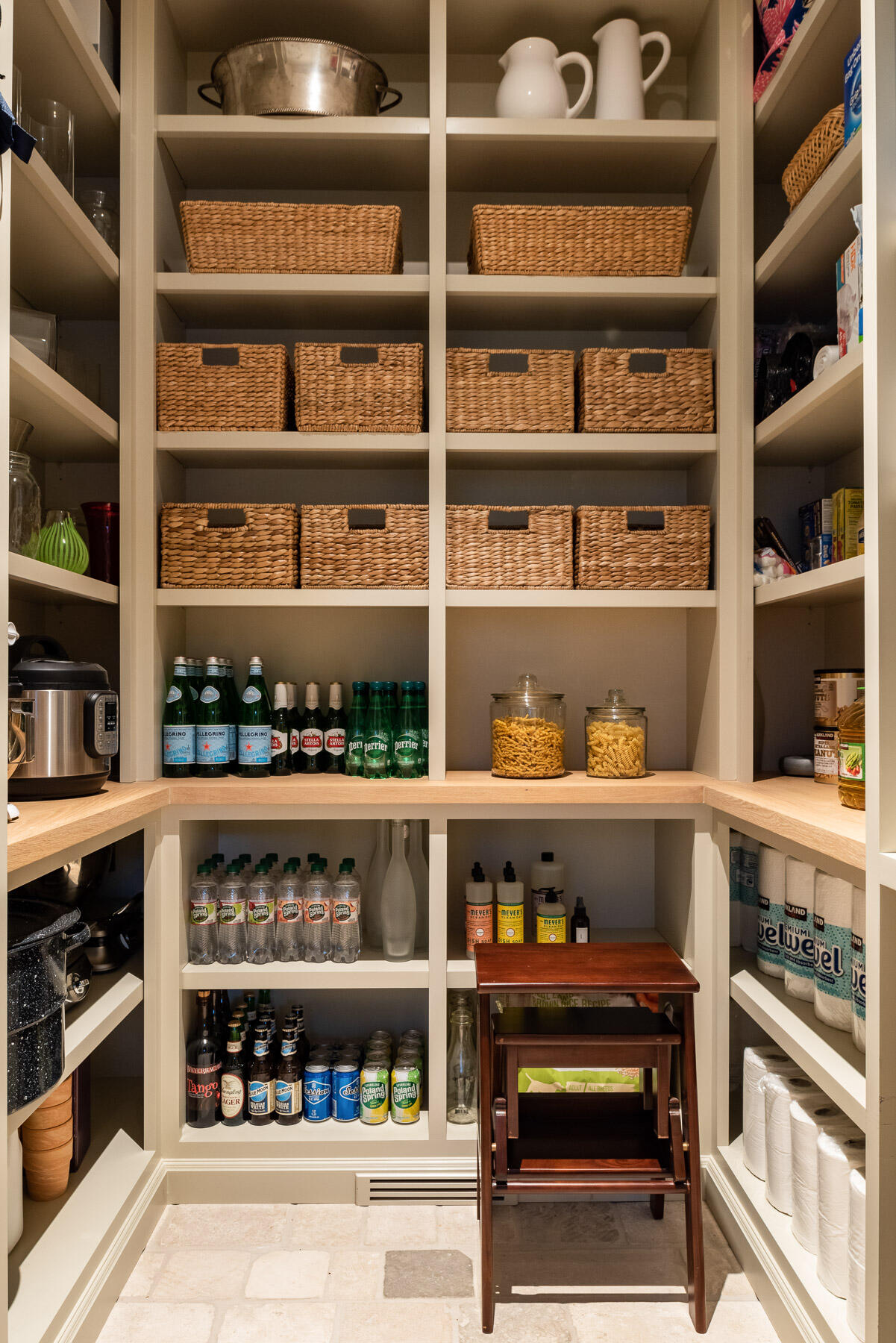 16 Raiders Lane Darien, CT 06820 - Photo 45 of 53 a kitchen with a lot of shelves and a wooden floor
