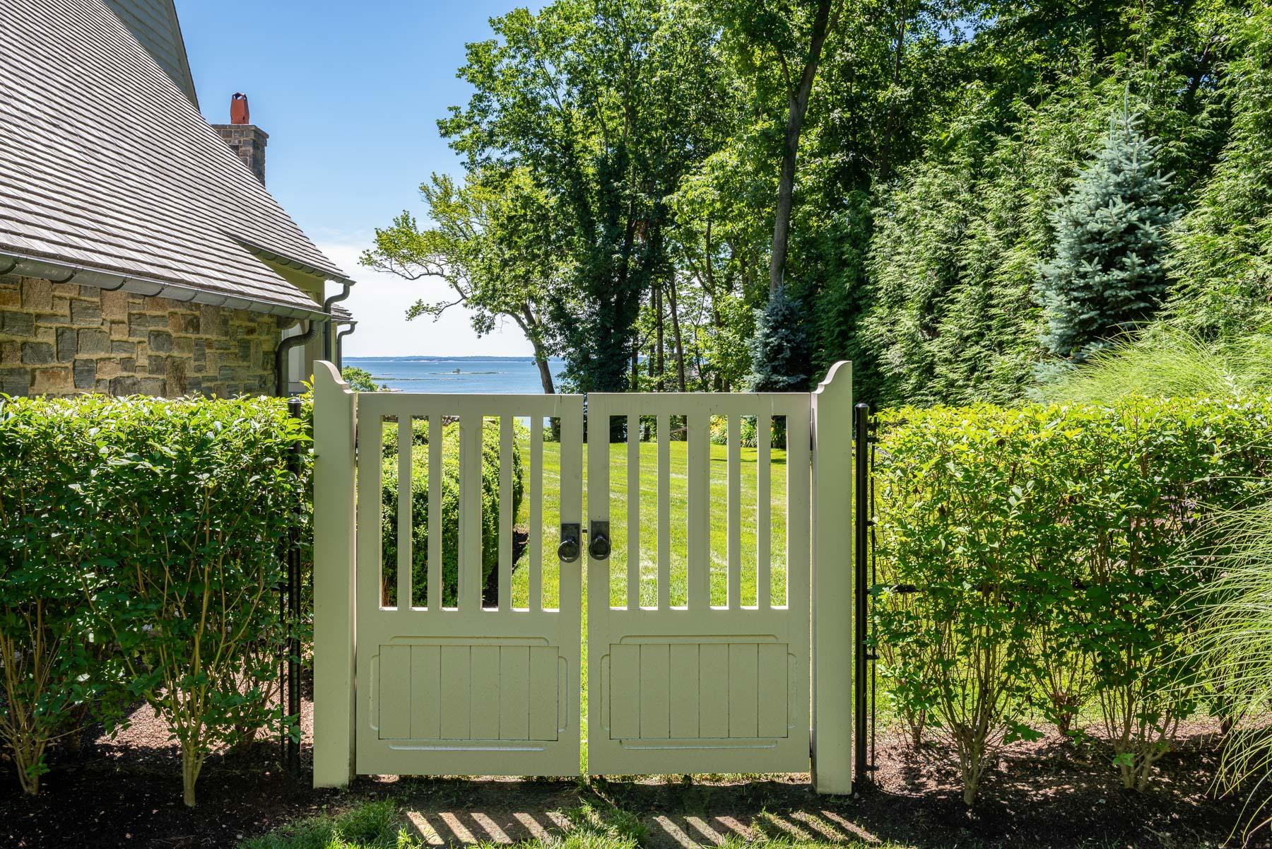 16 Raiders Lane Darien, CT 06820 - Photo 48 of 53 a view of a house with a yard