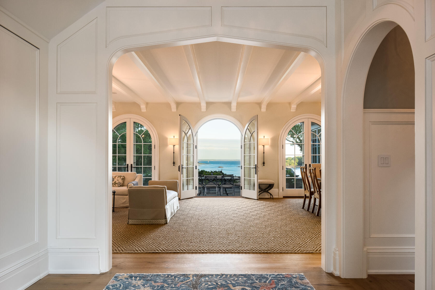 16 Raiders Lane Darien, CT 06820 - Photo 9 of 53 a living room with furniture and a floor to ceiling window