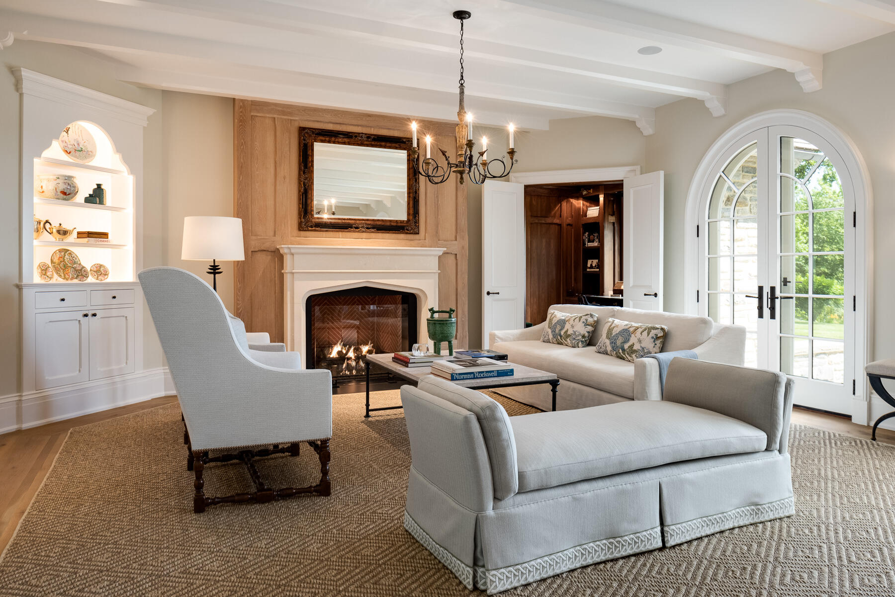 16 Raiders Lane Darien, CT 06820 - Photo 10 of 53 a living room with furniture a fireplace and a chandelier