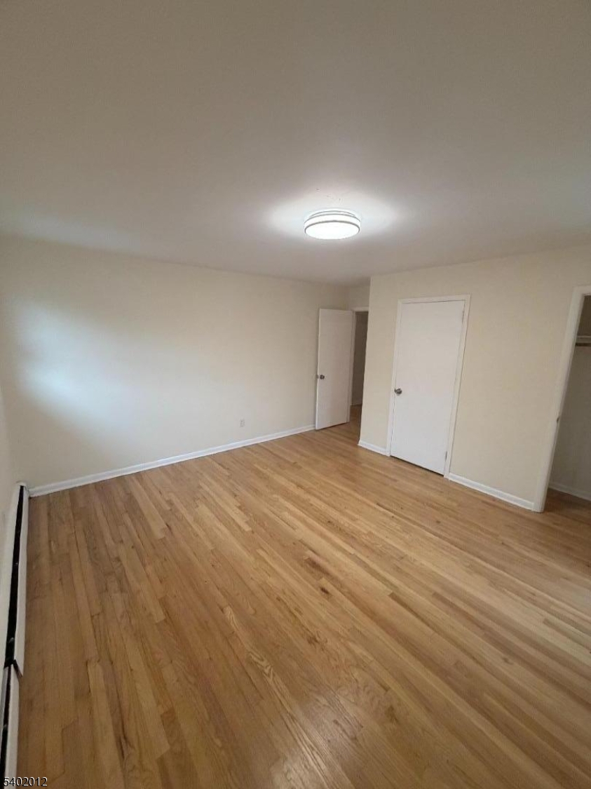 360 Highland Avenue, Unit 2 Passaic, NJ 07055 - Photo 20 of 23 a view of empty room