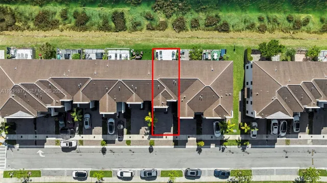 a view of a city with a lake