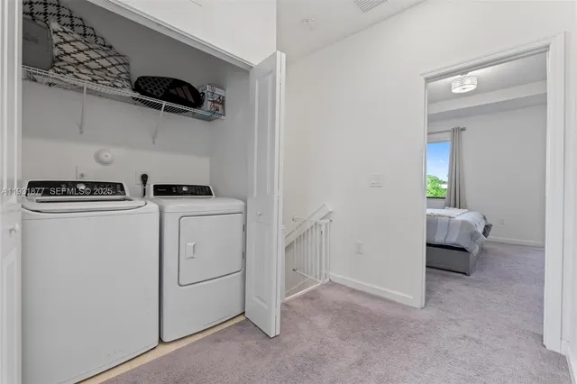 a bedroom with a bed and a night stand