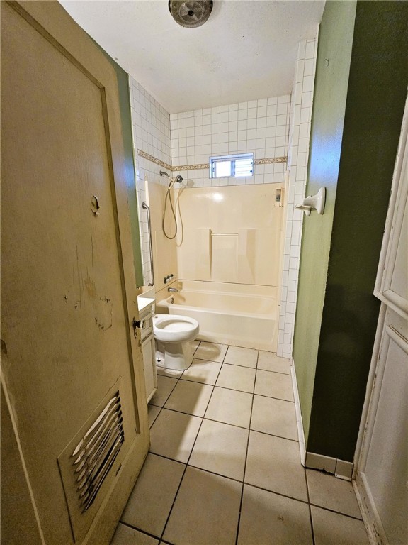 3218 McArdle Road Corpus Christi, TX 78415 - Photo 17 of 32 a bathroom with a sink a toilet and shower