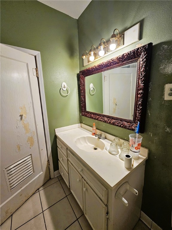 3218 McArdle Road Corpus Christi, TX 78415 - Photo 18 of 32 a bathroom with a sink and a mirror