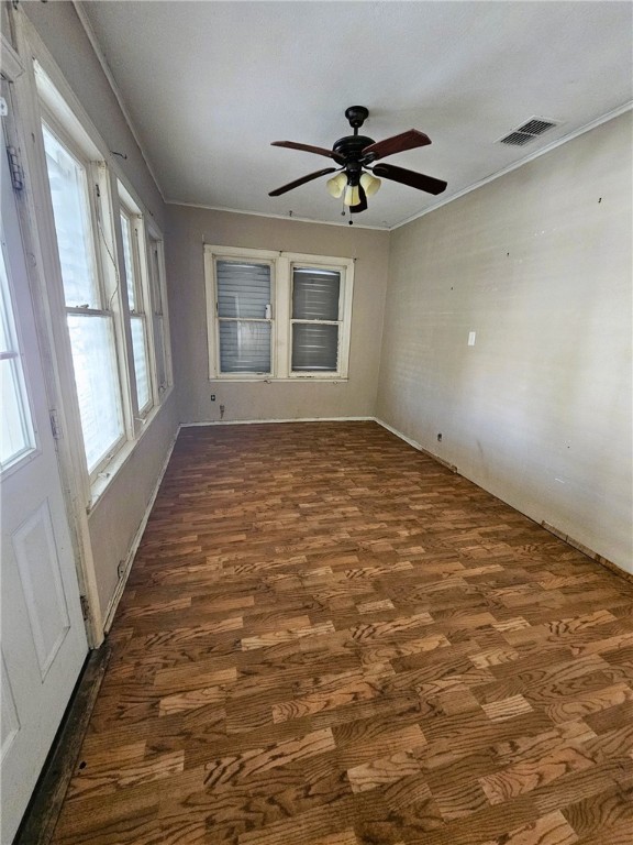 3218 McArdle Road Corpus Christi, TX 78415 - Photo 20 of 32 a view of an empty room with a window and wooden floor