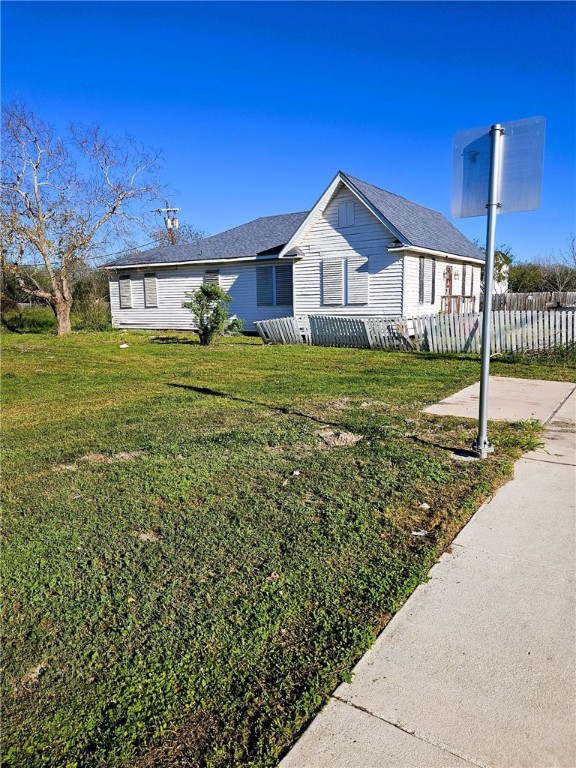 3218 McArdle Road Corpus Christi, TX 78415 - Photo 29 of 32 a front view of a house with garden