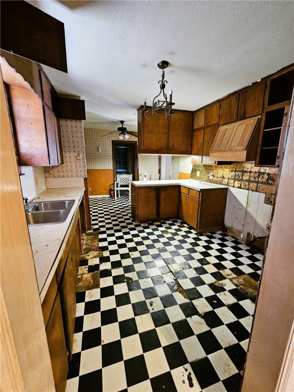 3218 McArdle Road Corpus Christi, TX 78415 - Photo 9 of 32 a kitchen with a sink a stove and a refrigerator