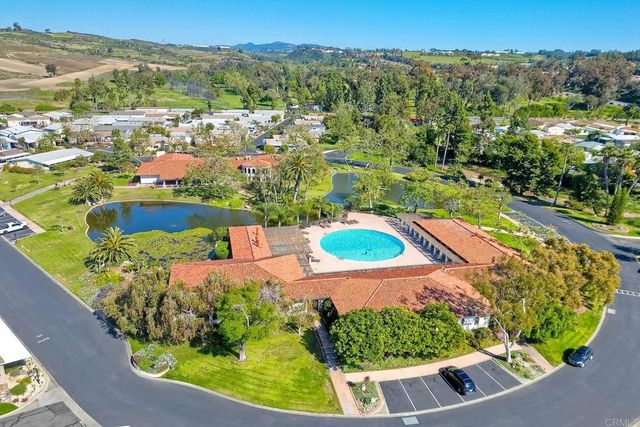 an aerial view of a swimming pool