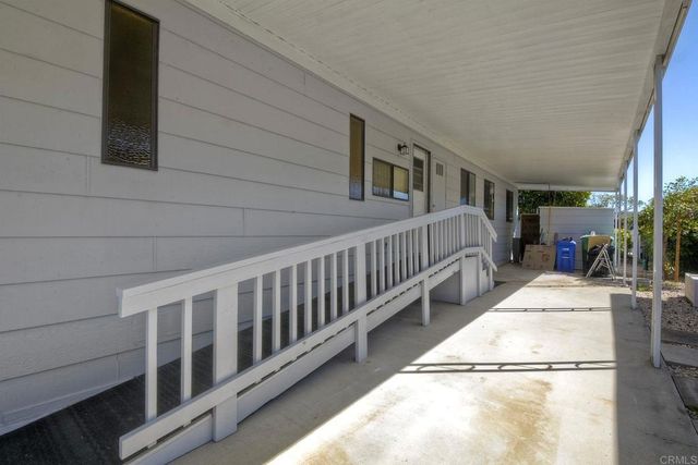 a front view of a house having yard