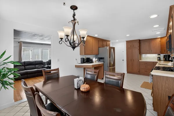 a view of kitchen and dining area with furniture