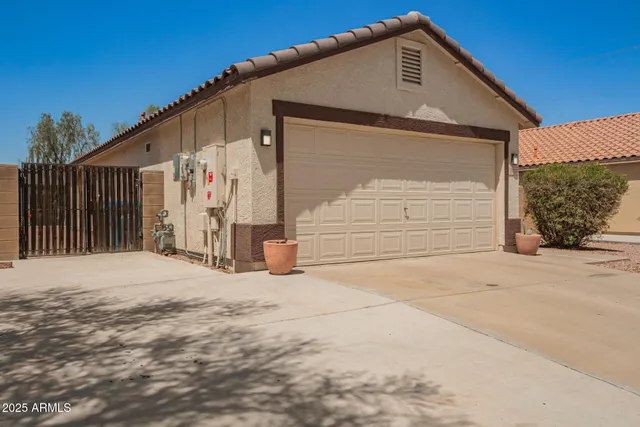 a front view of a house with a garage