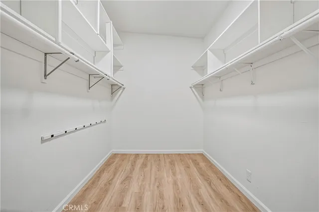 a view of a room with racks on the wall