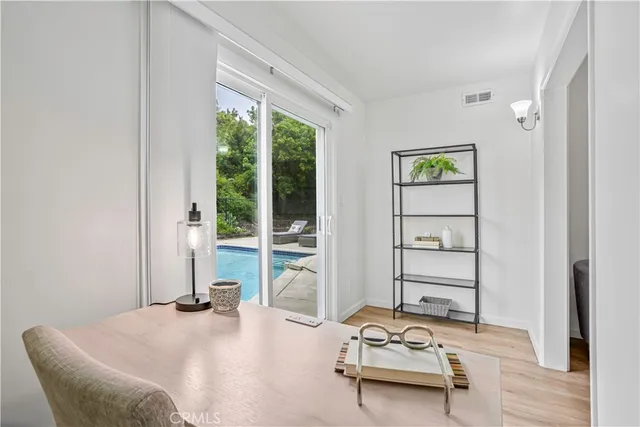 a bedroom with furniture and window