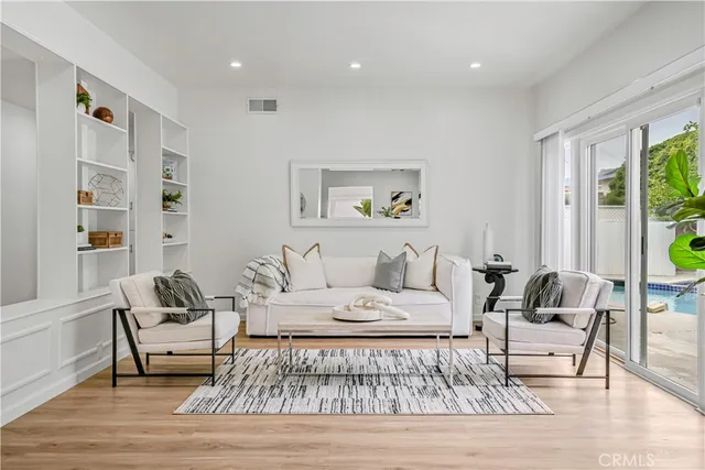 a living room with furniture and a table