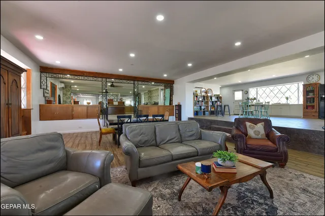 a bedroom with a bed and a chair