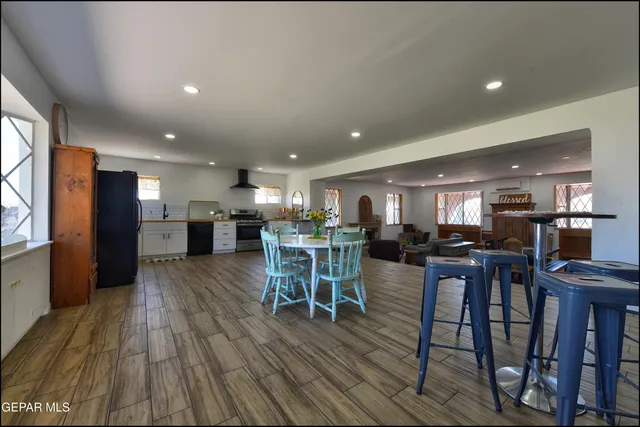 a view of a balcony with furniture