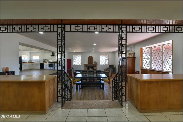 a spacious bathroom with a sink and a mirror