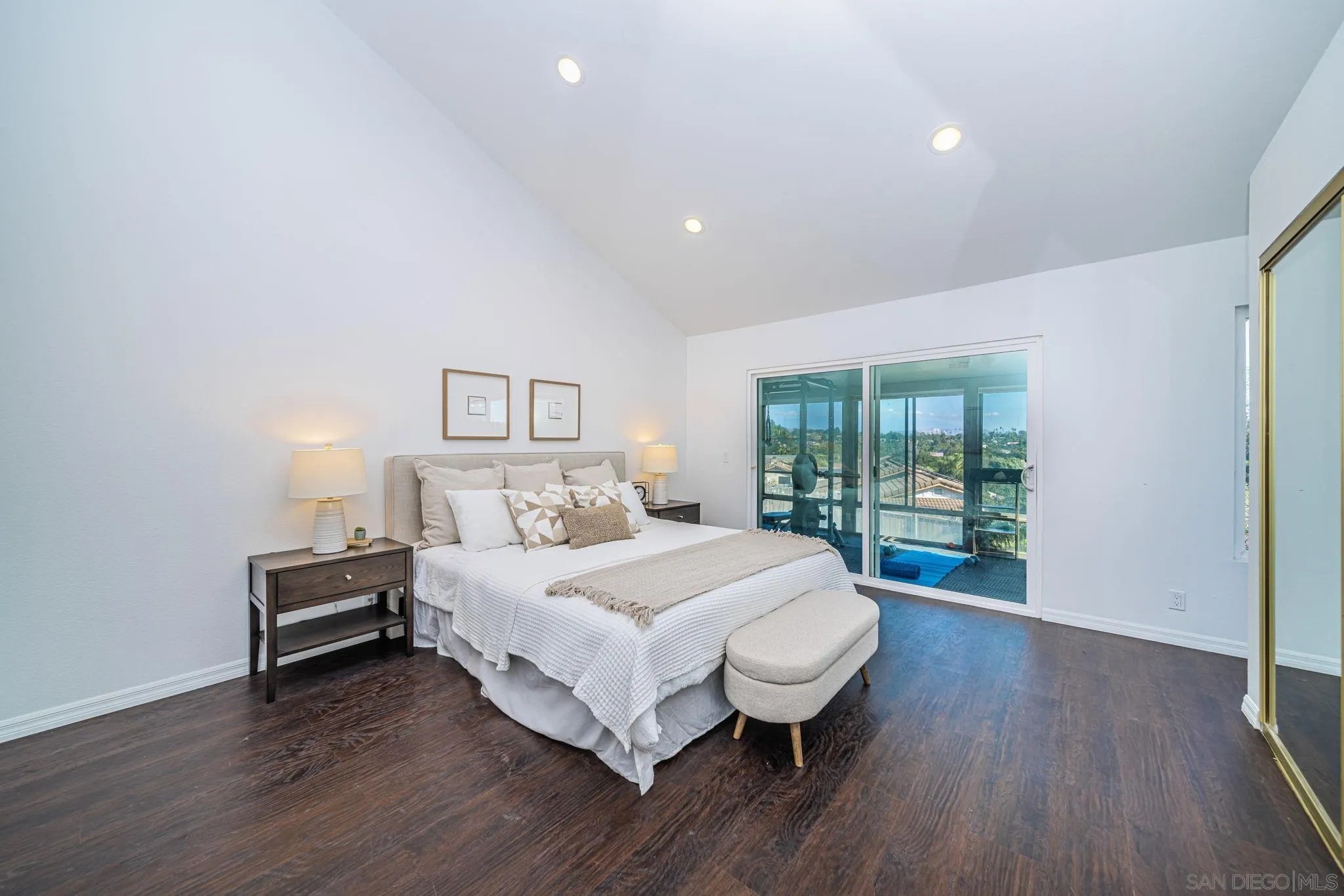 1396 Friends Way Fallbrook, CA 92028 - Photo 26 of 52 a bedroom with a bed and wooden floor