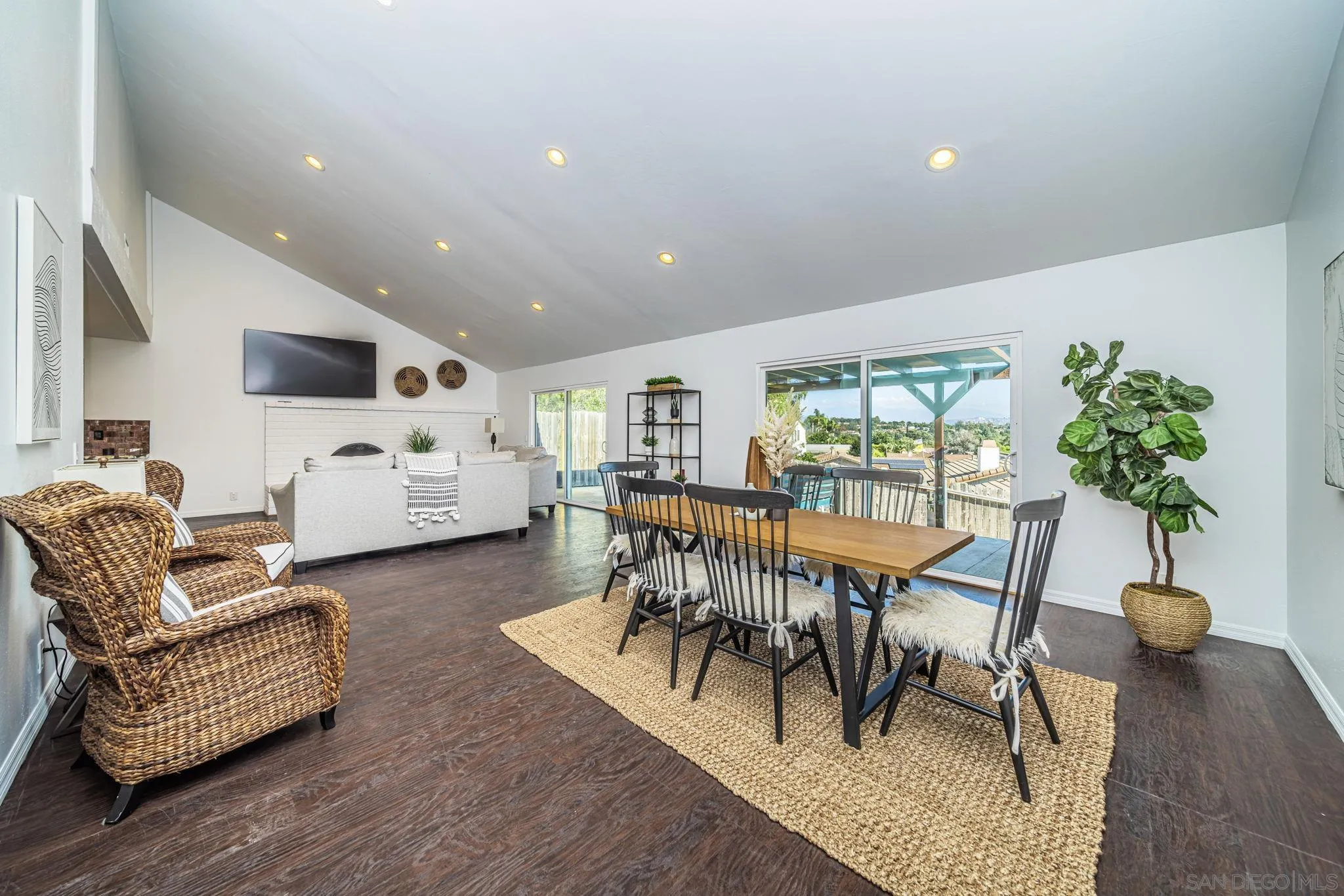 1396 Friends Way Fallbrook, CA 92028 - Photo 3 of 52 a living room with furniture a dining table and a potted plant