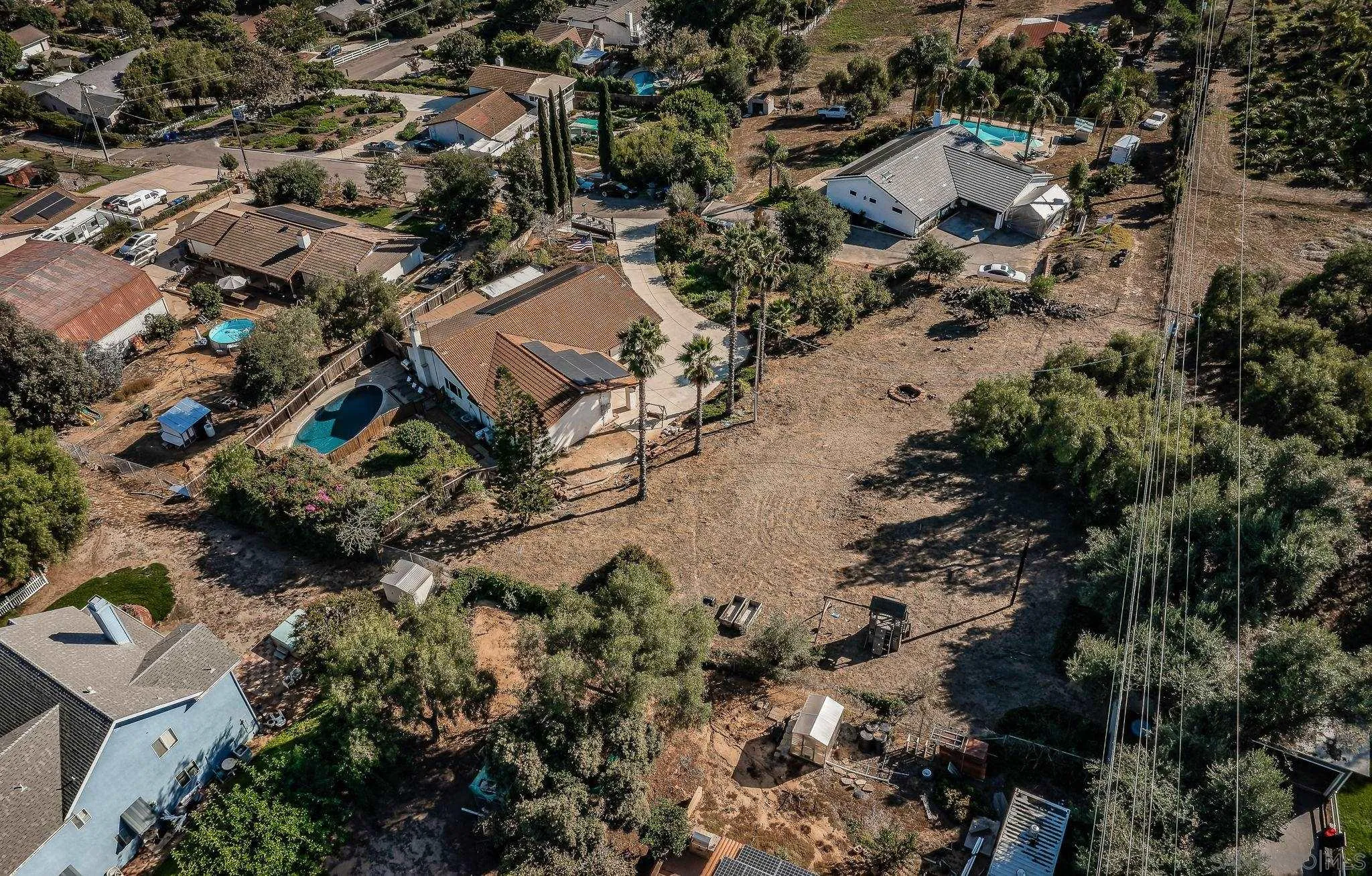 1396 Friends Way Fallbrook, CA 92028 - Photo 38 of 52 an aerial view of residential houses with outdoor space