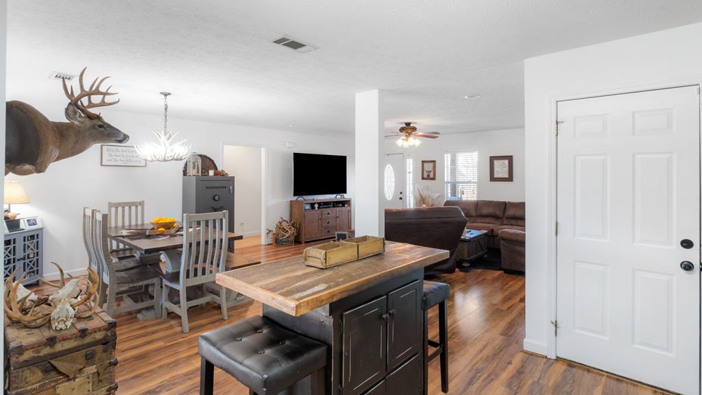 165 Firetower Road Buena Vista, GA 31803 - Photo 11 of 30 a view of a livingroom with furniture and a flat screen tv