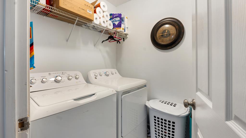 165 Firetower Road Buena Vista, GA 31803 - Photo 22 of 30 a utility room with dryer and washer