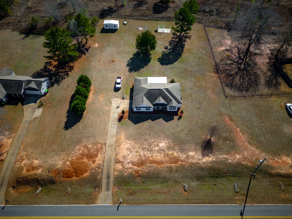 165 Firetower Road Buena Vista, GA 31803 - Photo 24 of 30 an aerial view of a house with a yard