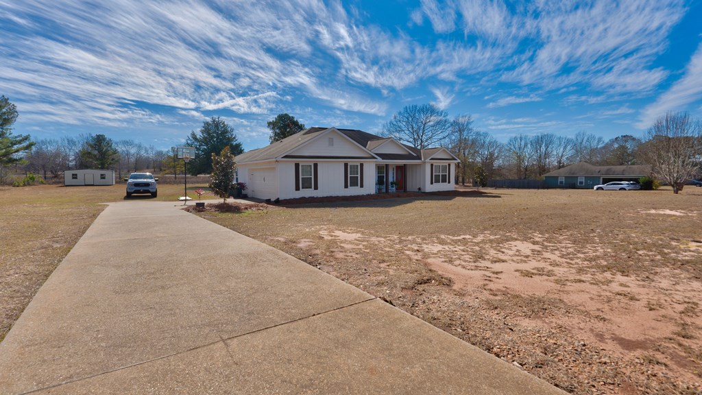 165 Firetower Road Buena Vista, GA 31803 - Photo 4 of 30 a view of a house with a yard