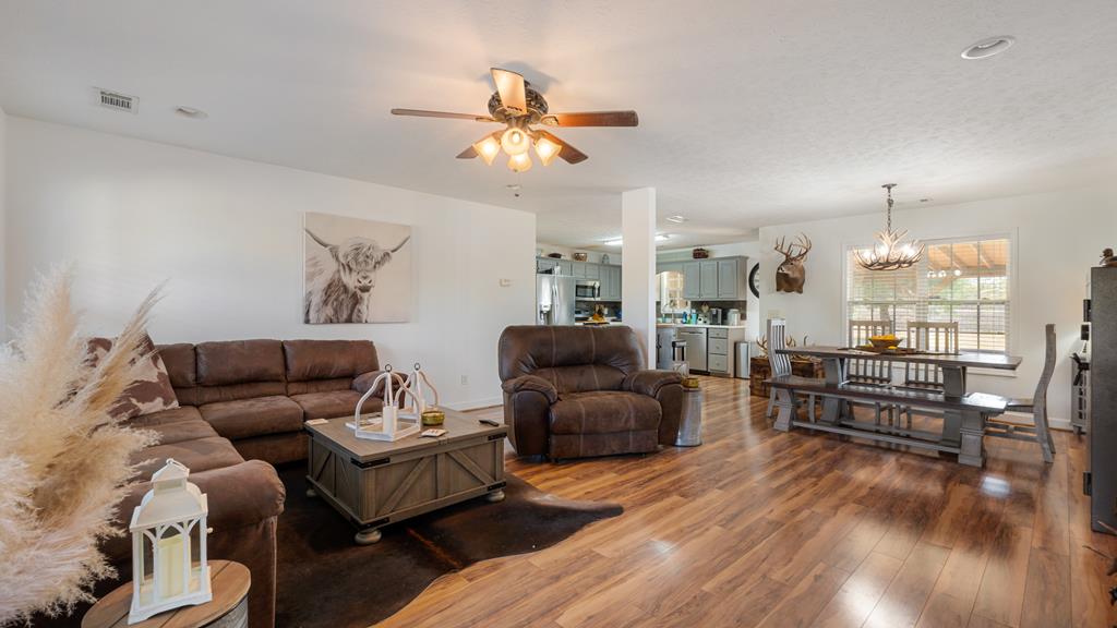 165 Firetower Road Buena Vista, GA 31803 - Photo 6 of 30 a living room with furniture and wooden floor