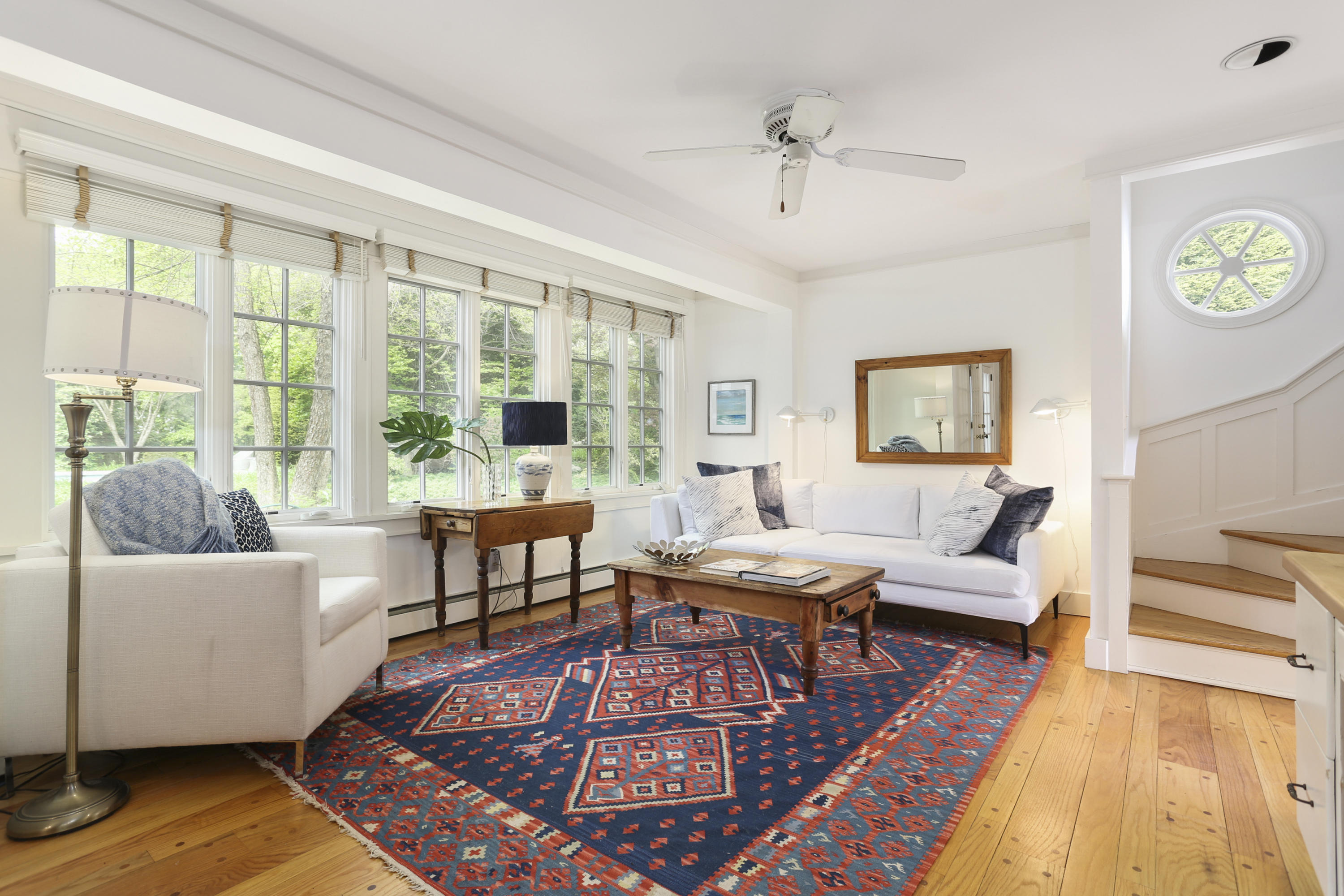 5 Meadowbrook Road Darien, CT 06820 - Photo 13 of 40 a living room with furniture and a large window