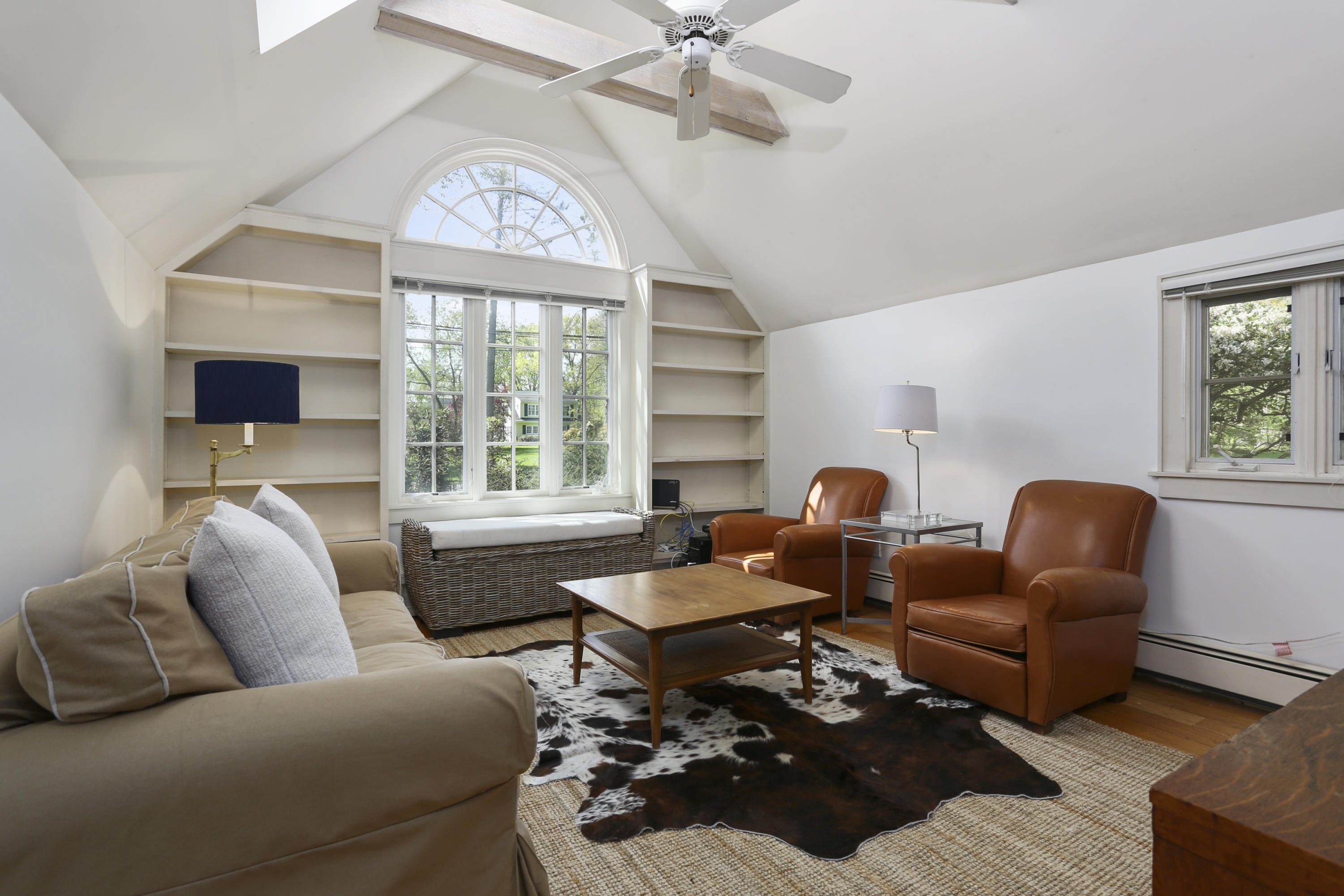 5 Meadowbrook Road Darien, CT 06820 - Photo 17 of 40 a living room with furniture fireplace and a large window