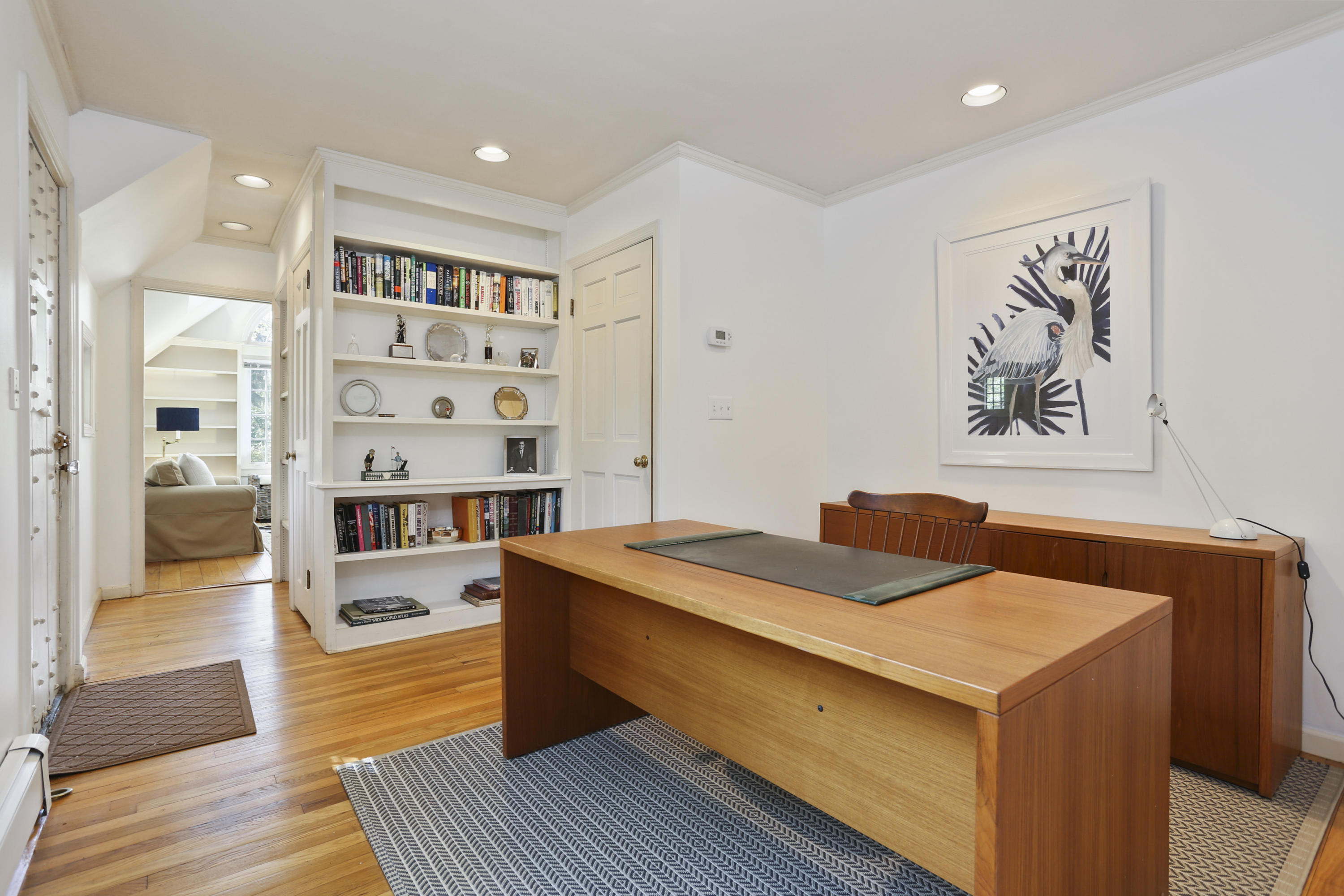 5 Meadowbrook Road Darien, CT 06820 - Photo 19 of 40 a bed room with a bed and a book shelf