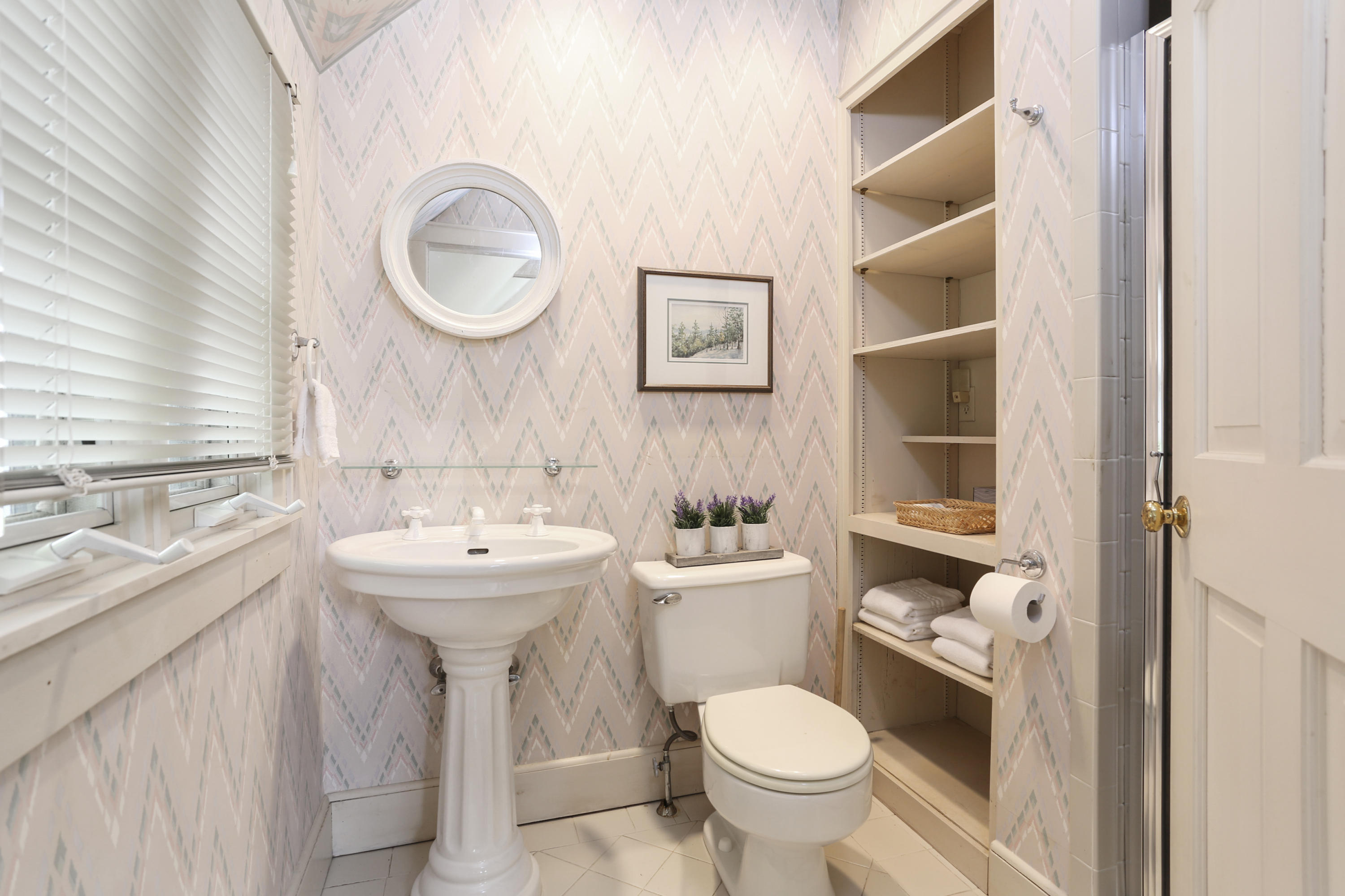 5 Meadowbrook Road Darien, CT 06820 - Photo 20 of 40 a bathroom with a sink toilet and a mirror