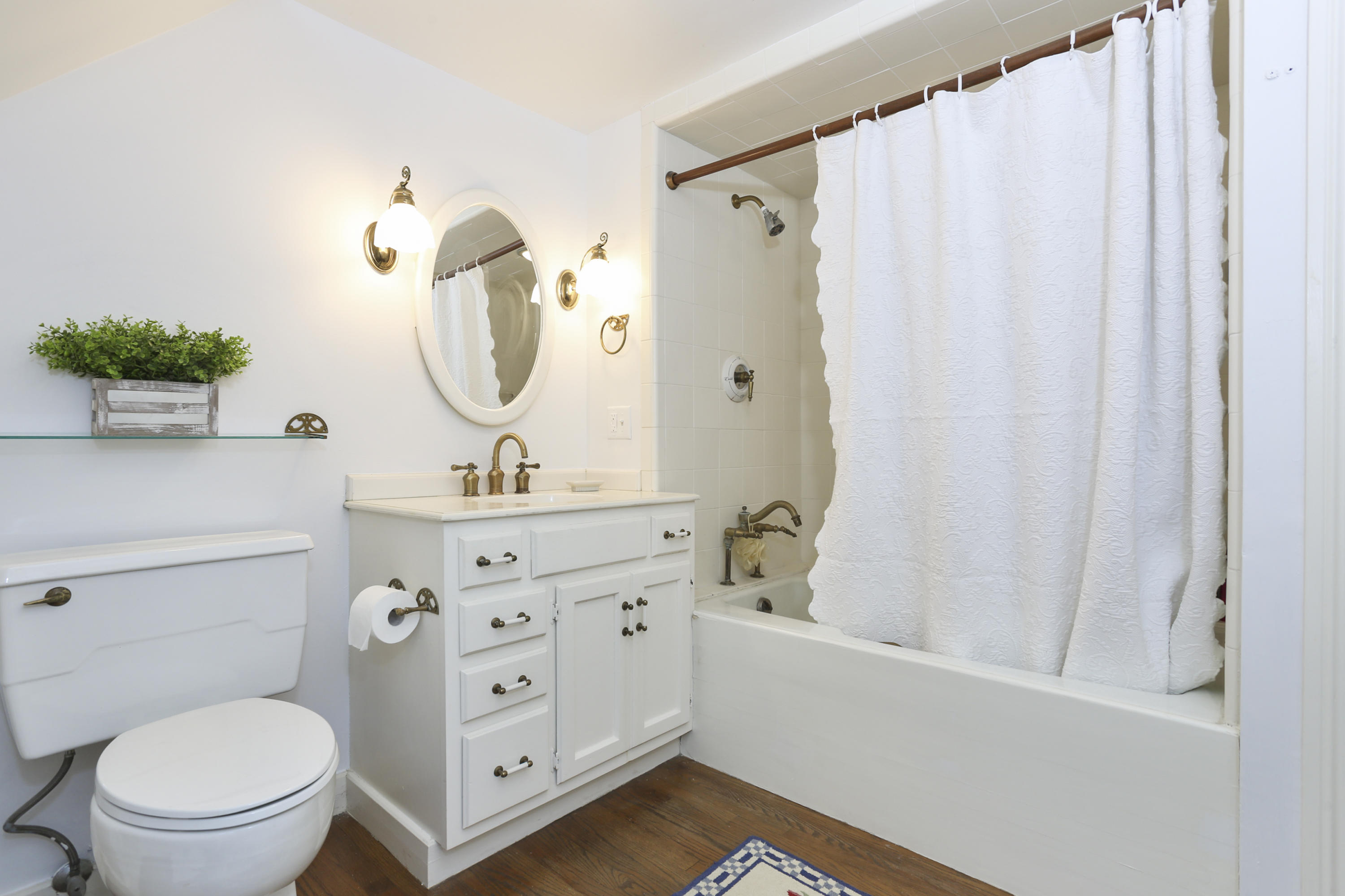 5 Meadowbrook Road Darien, CT 06820 - Photo 24 of 40 a bathroom with a double vanity sink mirror and toilet