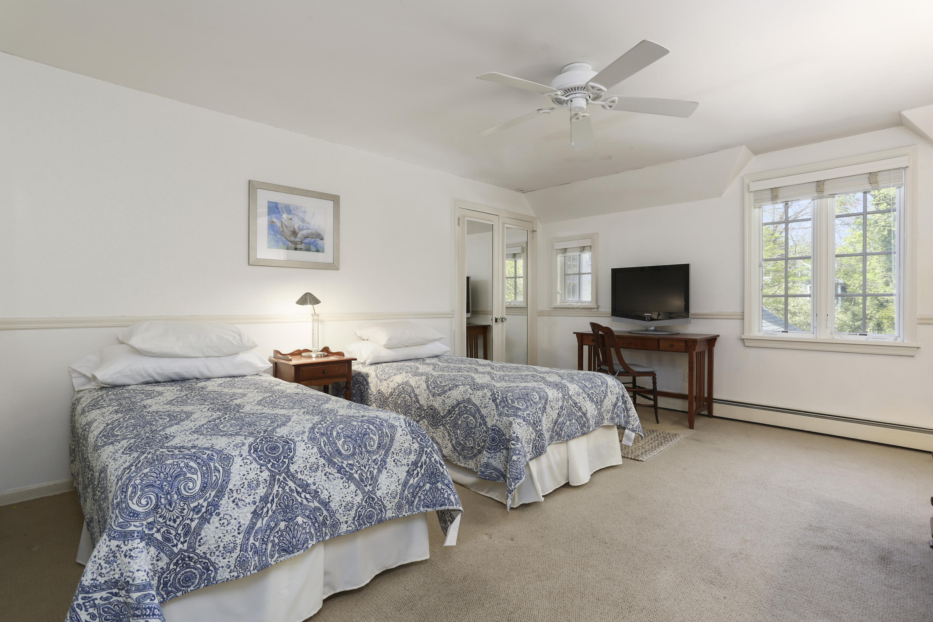 5 Meadowbrook Road Darien, CT 06820 - Photo 27 of 40 a bedroom with two beds and a window