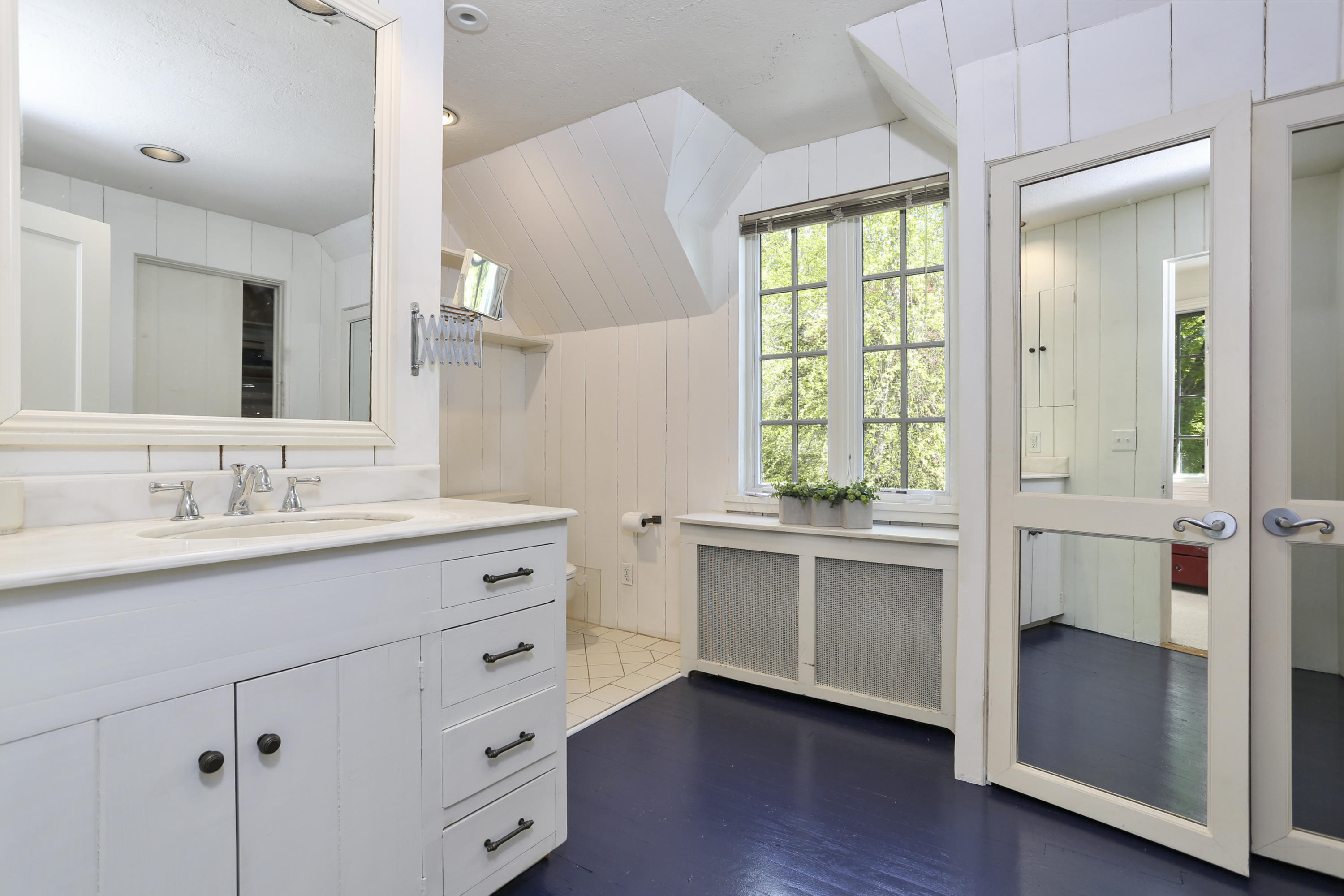 5 Meadowbrook Road Darien, CT 06820 - Photo 32 of 40 a bathroom with a granite countertop sink mirror and window