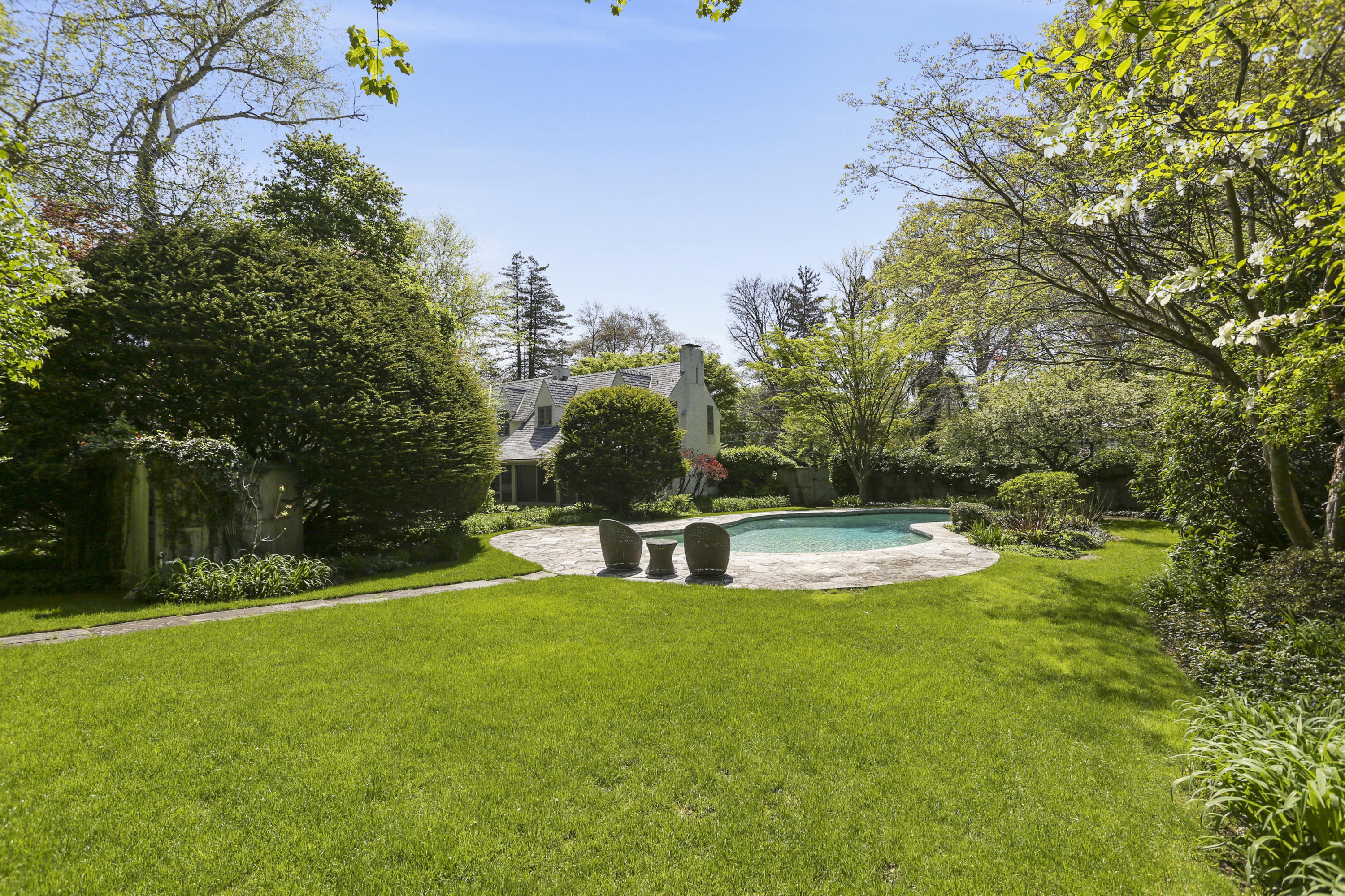 5 Meadowbrook Road Darien, CT 06820 - Photo 36 of 40 a view of a swimming pool with a yard