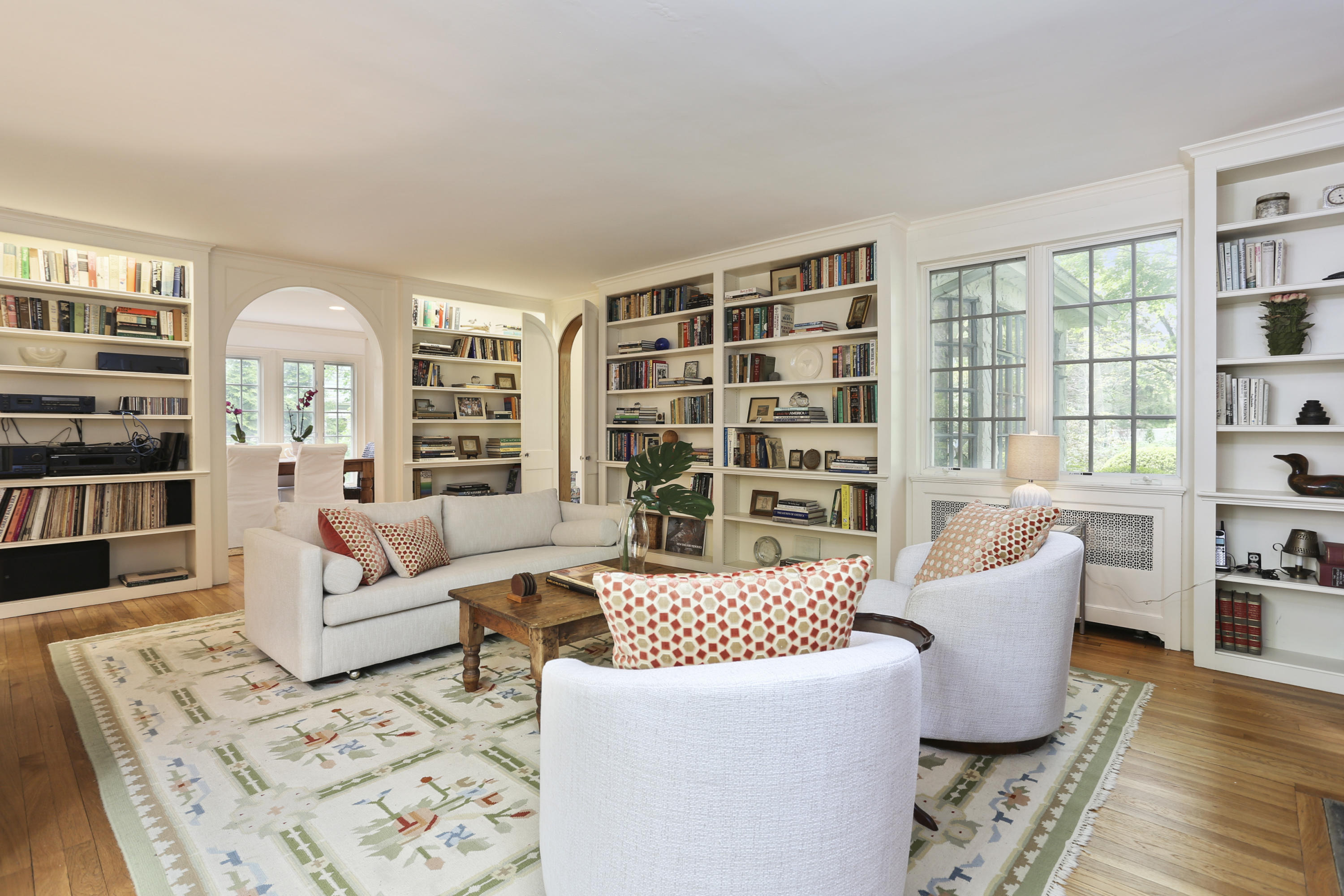 5 Meadowbrook Road Darien, CT 06820 - Photo 6 of 40 a living room with furniture and a floor to ceiling window or shelf